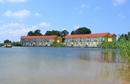 Perleberg Resort | Ferienappartement am See im Hotelresort Neuer Hennings Hof