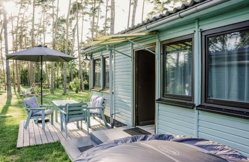 Luetow House | Ferienhäuser Insel Usedom Waldhaus 2 mit Whirlpool - Direkt am Achterwasser