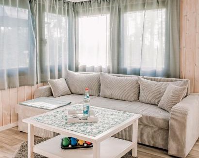 Luetow House | Ferienhäuser Insel Usedom Waldhaus 2 mit Whirlpool - Direkt am Achterwasser