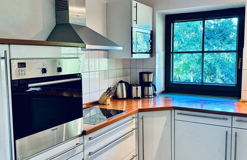 Trips House | Ferienhaus Boddenblick - Charming semi-detached house in Trips on Rügen -