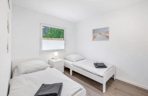 Neuhaus House | Ferienhaus Dünenwald