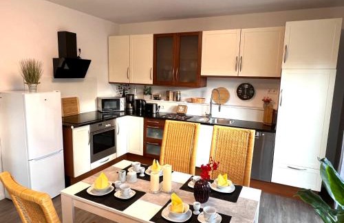 Apeldorn Apartment | Ferienhaus "Jonagold" Meppen Ebenerdig Carport Terrasse Free WiFi 2 Schlafzimmer Küche Gäste-WC Wallbox