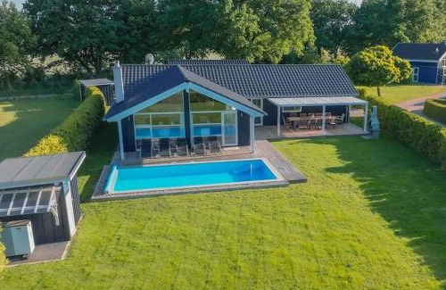 Dummer House | Ferienhaus mit Pool und Sauna am Duemmer See