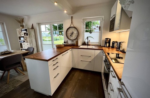 Olpenitz House | Ferienhaus Sliminde by Seeblick Ferien, direkte Wasserlage,E-Ladesäule,Sauna
