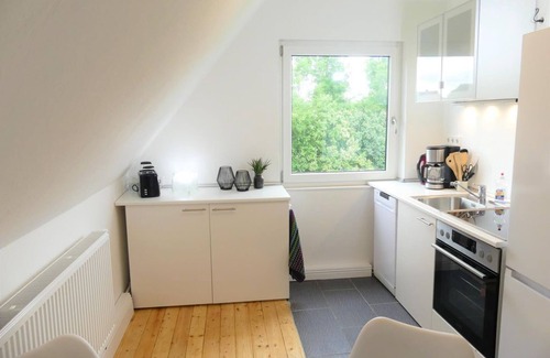 Nordseebad Burhave Apartment | Ferienwohnung Blaubeer - Ferienhaus Beerennest