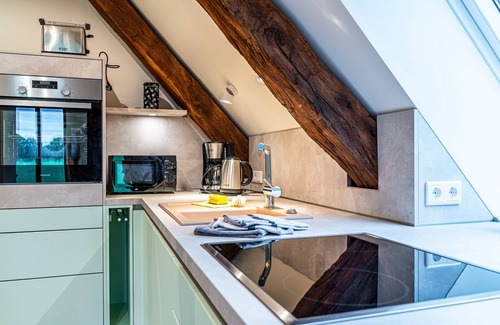 Versmold Apartment | Ferienwohnung Eschblick für 2-4 Personen Kamin, Balkon und Sauna