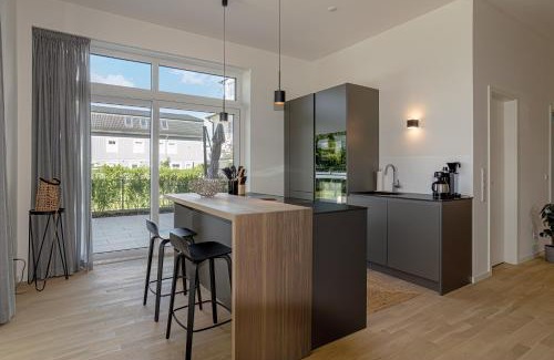 Kalifornien Apartment | Ferienwohnung Gartenlounge Schönberg - Kalifornien