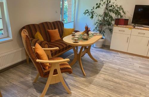 Augustfehn Apartment | Ferienwohnung Gulfhaus, mit Sauna und großem Garten