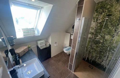 Wiesmoor Apartment | Ferienwohnung Haus Moorblick mit Garten in Kanallage