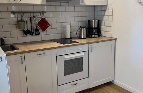 Dorphof Apartment | Ferienwohnung "hier Oben" in Schwansen
