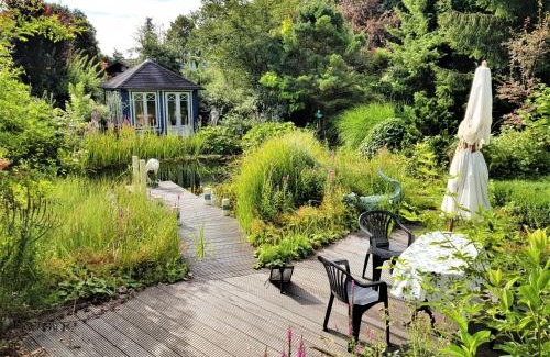Eurasburg Apartment | Ferienwohnung im Gartenparadies