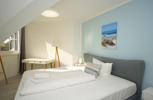 Gross Zicker Apartment | Ferienwohnung mit Balkon, gratis Sauna- und Schwimmbadnutzung im AHOI in Sellin - Haus Inselwind FeWo MEERsonne