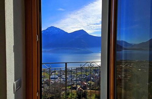 Stazzona Apartment | Ferienwohnung mit Terrasse mit Seeblick, Bbq, Garten, Wlan, TV Sat. Parkplatz