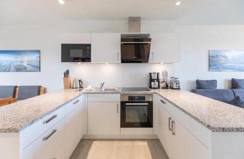 Norderhafen Apartment | Ferienwohnung Nordseetraum direkt am Nordseedeich mit Blick auf den See