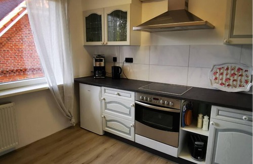 Amelinghausen Apartment | Ferienwohnung Seeromantik im Ortskern mit Kamin. Für Familien. Hundefreundlich