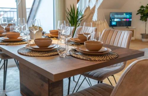 Mering Apartment | Ferienwohnung "Zugspitze" - 95qm Maisonette in Mering Zentrum
