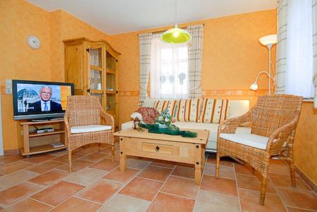 Neuharlingersiel Apartment | Ferienwohnungen Haus Hafenperle