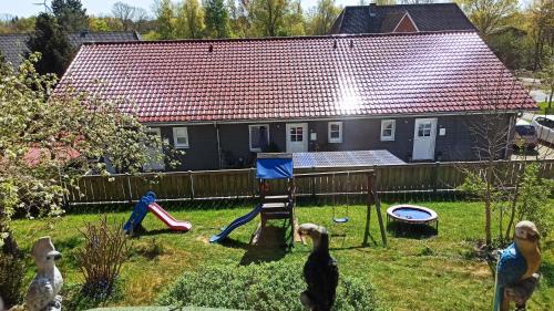 Oldersbek Apartment | Ferienwohnungen im Reetdachhaus
