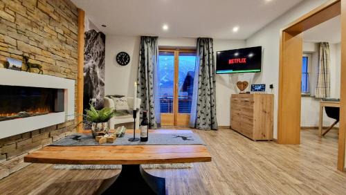 Ried Apartment | Ferienwohnungen Wolf - Wohnung" Kienberg" mit Bergblick
