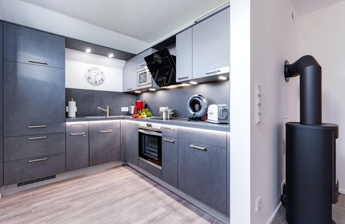 Olpenitz Apartment | Fewo Kapitän James Cook Olpenitz, E-Ladesäule, Allergiker, Wasserbett,