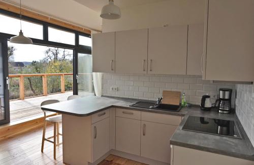 Bad Freienwalde Apartment | FeWo OG am Fluss mit Balkon - ein himmlischer Ausblick