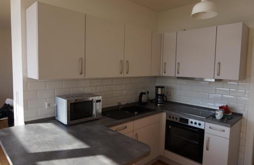 Bad Freienwalde Apartment | FeWo OG am Fluss mit Balkon - ein himmlischer Ausblick