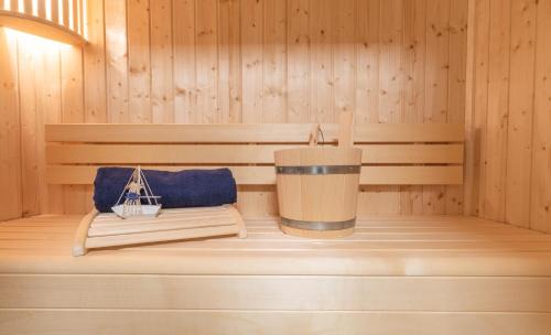 Dorumer Neufeld Apartment | FeWo Seebrise mit Sauna und Balkon