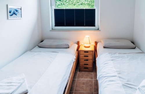 Bockholm House | fewo1846 - Waterkant - half of the bungalow near the beach with a garden for max