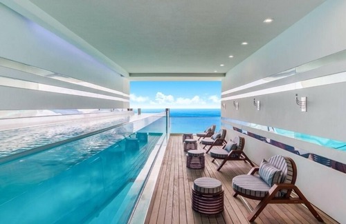 George Town Condo | FIN #14 - Art Deco Oceanfront Luxury Condo