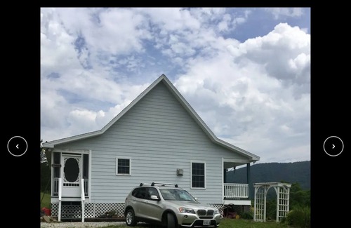 Criders House | Find your serenity at this mountain cottage with river access.