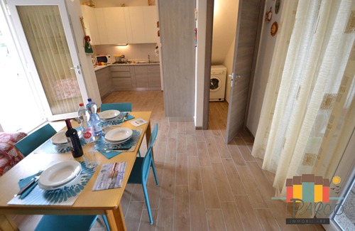 Rosolina Apartment | Fiordo Corallo fantastic sunset over water F 1268