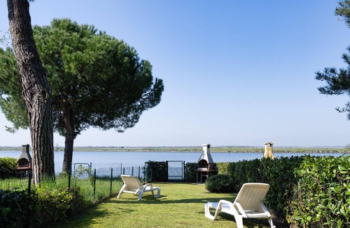 Rosolina Apartment | Fiordo Corallo fantastic sunset over water F 1268