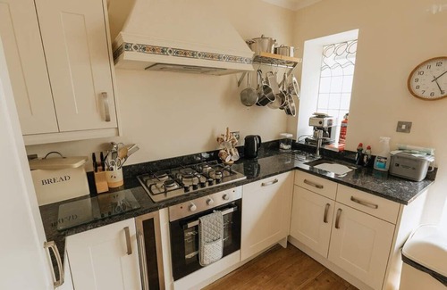 Penrhyn Bay House | FIR TREE COTTAGE/COSY 3 BED COTTAGE IN PENRHYN BAY WITH SEA VIEWS, ACCESS TO