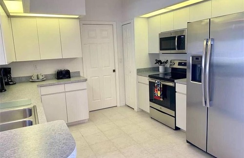 White Marsh House | First coffee, then pool, beaches, fishing, golf, dolphins .