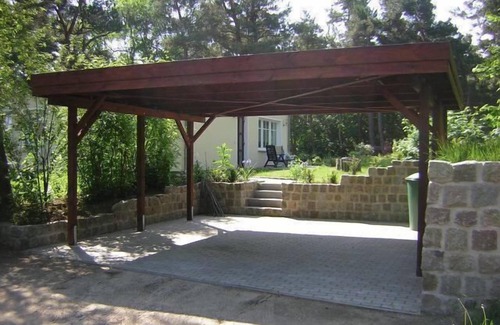 Riemserort House | First floor apartment by the water with terrace, carport parking space and WLAN