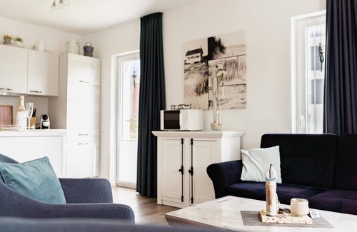 Schillig Apartment | First floor dream apartment with private sauna right on the water.