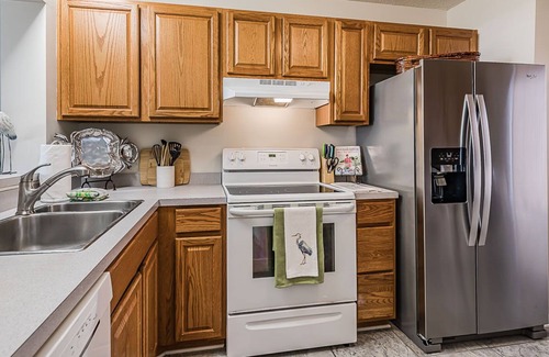 Oceanmarsh Subdivision Villa | First Floor Condo - Walking distance to beach and pools!