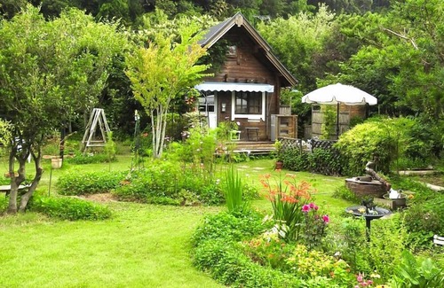 Isumi House | First in japan Earthbag House innEnglish Garden / Isumi Chiba