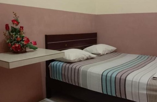Kisaran Timur House | First Inn Hotel
