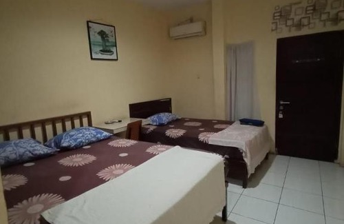Kisaran Timur House | First Inn Hotel