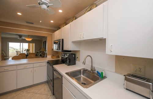 Siesta Key Condo | Fisherman's Cove A113 - The Dominican - Gulf Beach front steps from Lanai