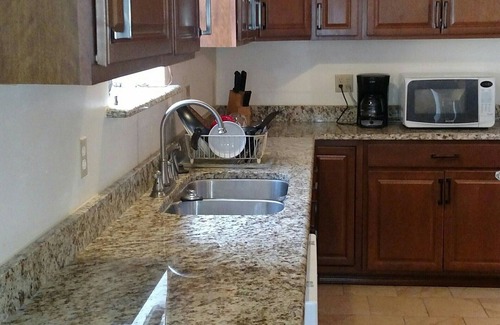 Yantis Apartment | Fisherman's Suite, Private King Bedroom, Two Double beds, Pier, Boat Ramp