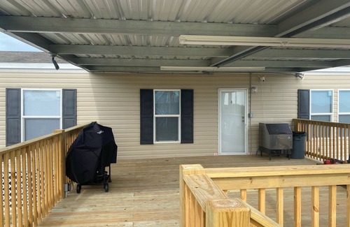Hackberry House | Fishing camp with water access and boat house