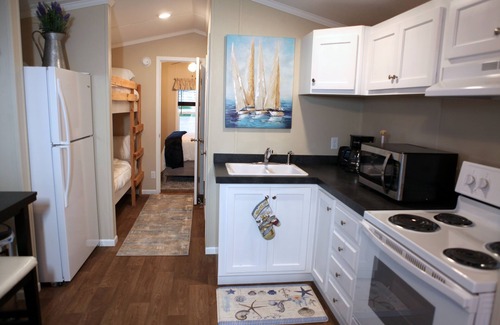 Eastpoint Cottage | (Fishing from dock) Boat launch, seafood market & bait-tackle shop next door.