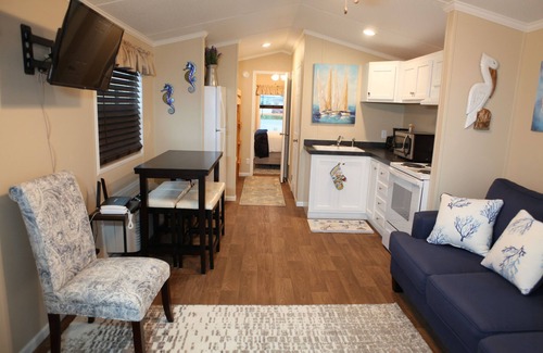 Eastpoint Cottage | (Fishing from dock) Boat launch, seafood market & bait-tackle shop next door.