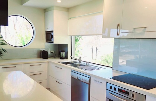 Smiths Lake House | Fishtales On the Lake - Exclusive “Couples Only” Private Waterfront Retreat.