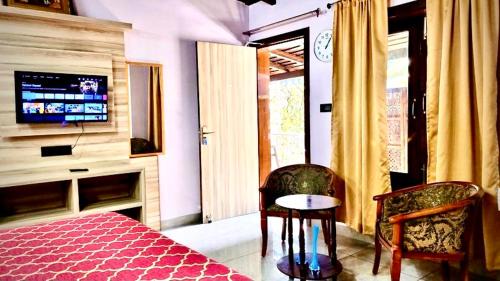 Mallital House | Flamingo Cottage