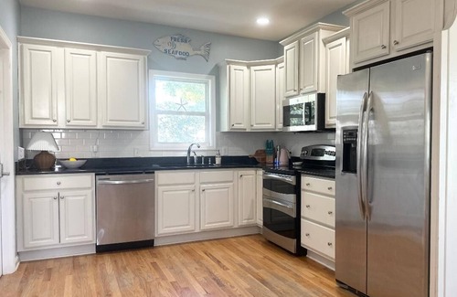 Tybee Island Cottage | FlaminGO Tybee ~ FREE Golf Cart, Hot Tub with Cabana Area + Coastal Marsh Views