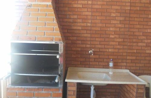 Aparecida House | FLAT COM AREA GOURMET para ATÉ 8 PESSOAS