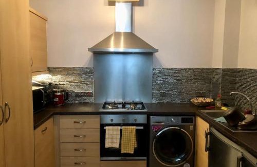 Dollis Hill Apartment | Flat in blue plaque building